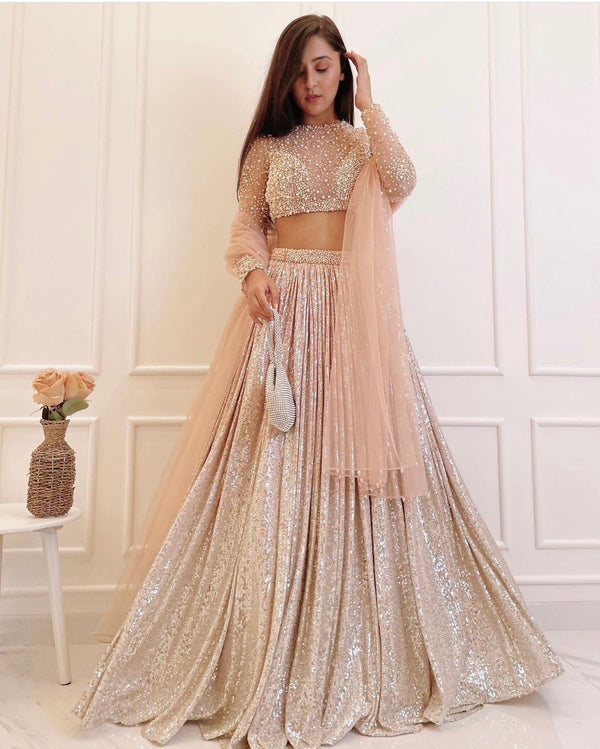 Peach Satin Silk Lehenga with Net Blouse, and Pearl-Embellished Dupatta