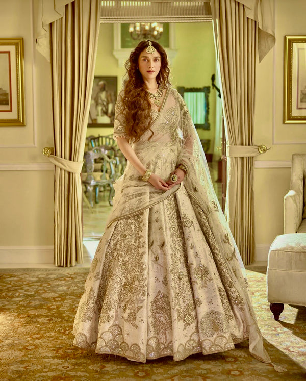 Off White Heavy Slub Silk Embroidered Lehenga Choli with Net Dupatta